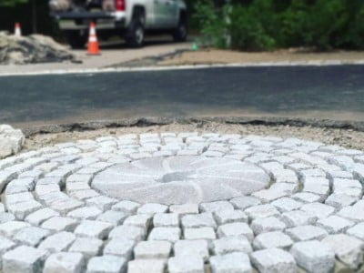 Crawley Paving Contractors Laying Cobblestones in Crawley